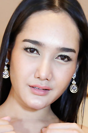 Beautiful Thai ladyboy takes white cock up her ass
