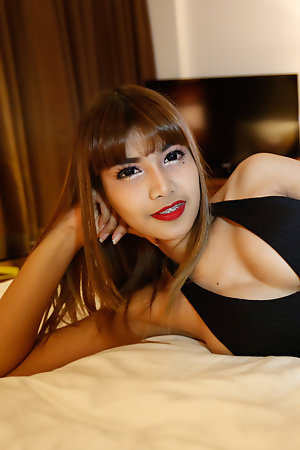 Pretty 26yo Thai ladyboy gets a mouthful of cum from big white cock