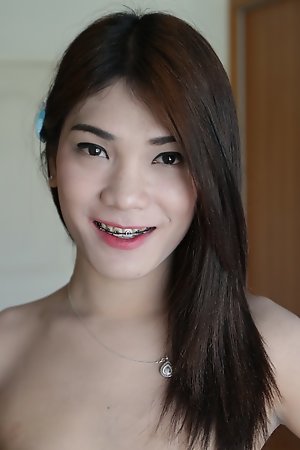 20yo Thai shemale does a striptease and gets fucked by white cock