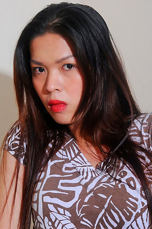 Small tits Ladyboy Alba get naked